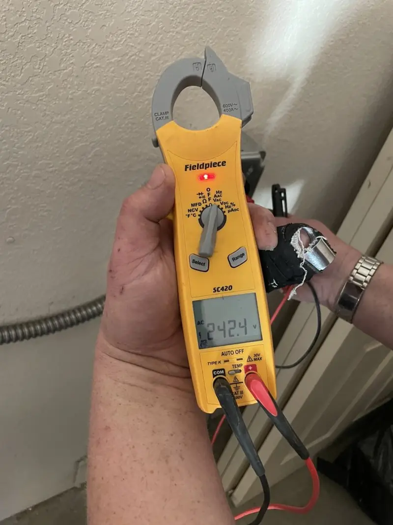 Voltage testing with clamp meter during Generator Installation in Fowler